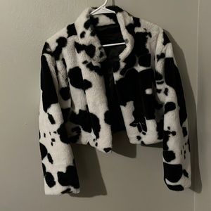 Fluffy cow print cropped jacket. Very good condition, rarely worn.